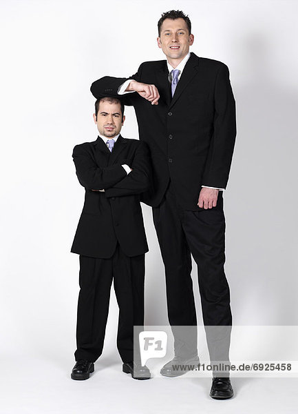 Short and Tall Businessmen
