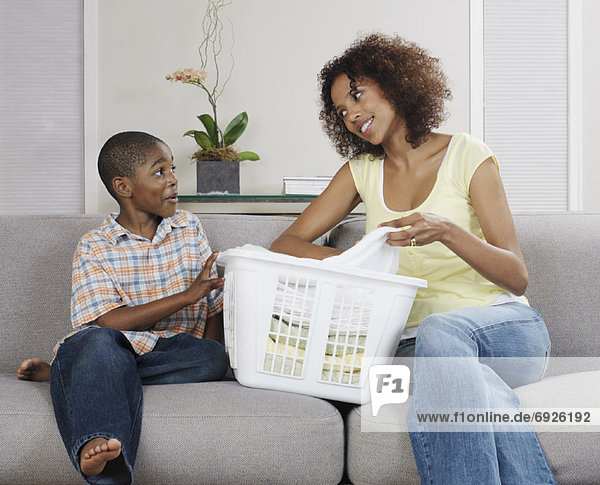 Mother and Son with Laundry