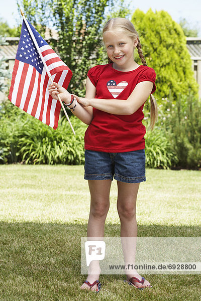Portrait of Girl Holding American Flag