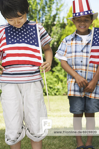 Boys Holding American Flags
