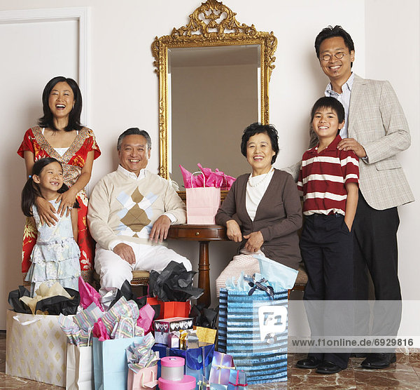 Portrait of Family with Shopping Bags