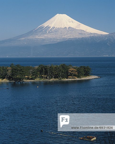 View of Mt. Fuji over a lake  Osezaki  Izu Peninsula  Shizuoka Prefecture  Japan