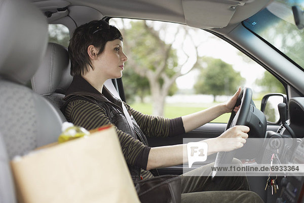 Woman Driving Vehicle