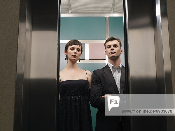 Portrait of Couple in Elevator