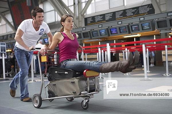 Couple Rushing Through Airport  Vancouver  British Columbia  Canada