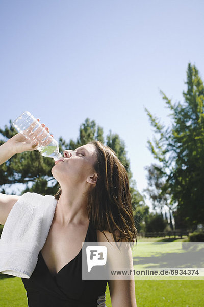 Woman Drinking Bottled Water