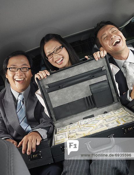 Businesspeople in Car