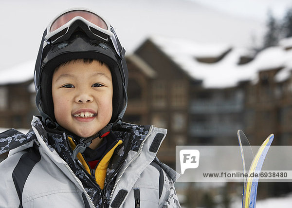 Portrait of Boy with Skis  Whistler  British Columbia  Canada