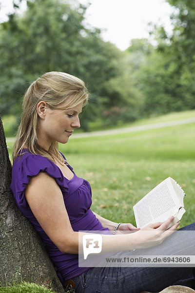 Woman Reading in Park