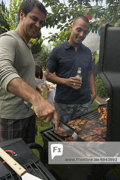 Men at Barbecue
