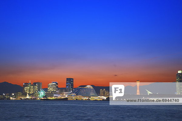 Kobe harbour and city skyline in the evening  Kobe  Hyogo Prefecture  Japan