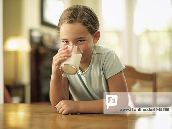 Little Girl Drinking Milk