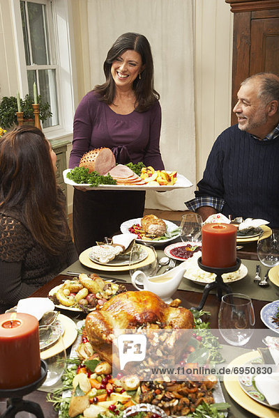 Woman Serving Thanksgiving Dinner