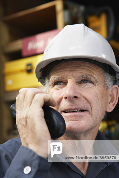 Portrait of Construction Worker with Cellular Phone