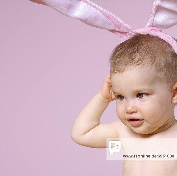 Baby Wearing Pink Rabbit Ears