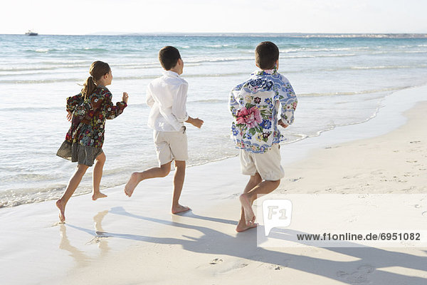 Children Running on the Beach