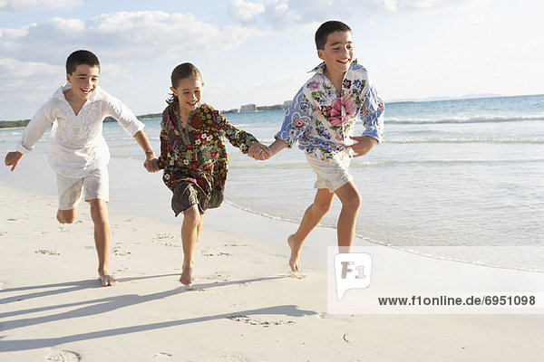 Children Running on the Beach