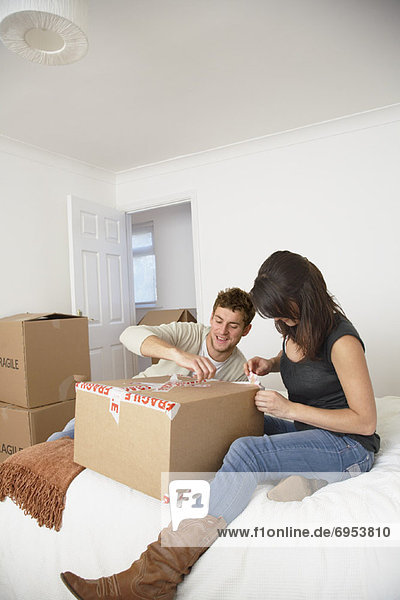 Couple Packing Box in Bedroom