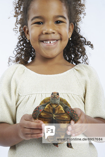Girl Holding Turtle