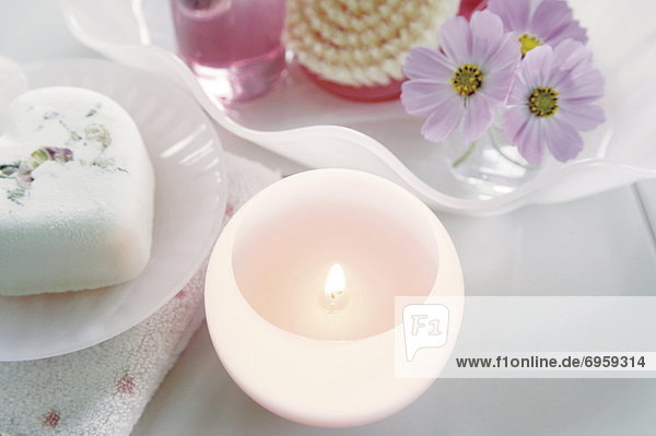 Aromatherapy candle  soap and flowers