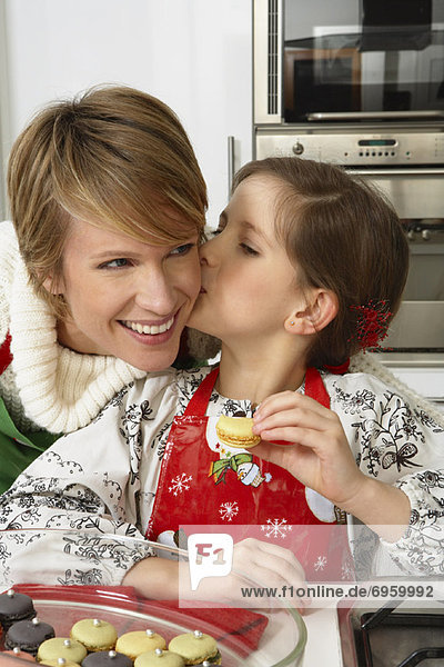 Mother and Daughter Making Christmas Cookies