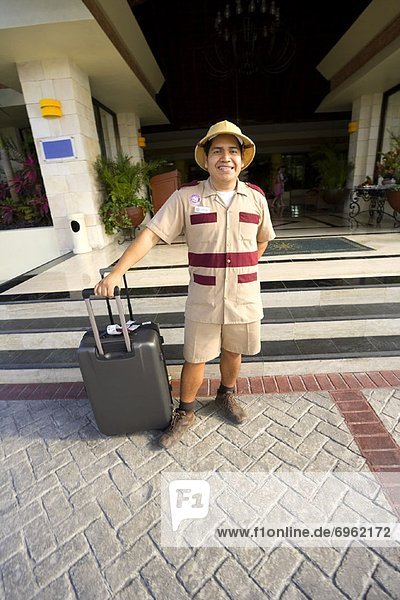Portrait of Bellhop in Front of Hotel  Mayan Riviera  Mexico