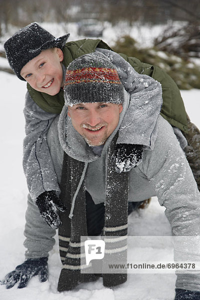 Father and Son Outdoors in Winter
