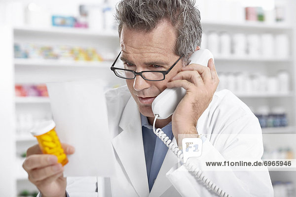 Pharmacist Talking on the Phone
