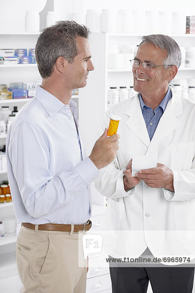 Pharmacist Talking to Client