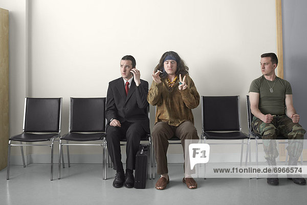 Businessman  Hippy and Soldier in Waiting Room