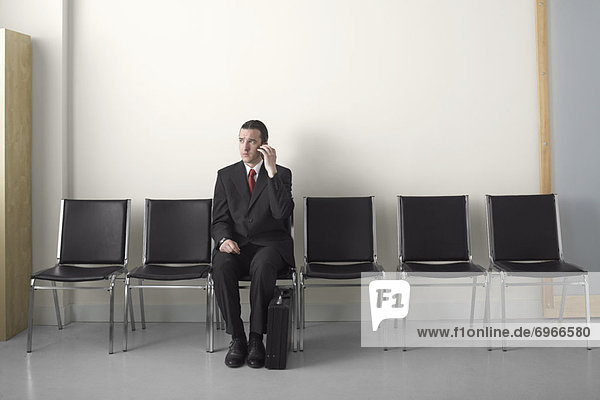 Businessman in Waiting Area