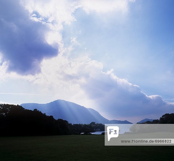 Clouds Over Mountains And Lake Ring Of Kerry Upper Lake Killarney County Kerry Republic Of Ireland