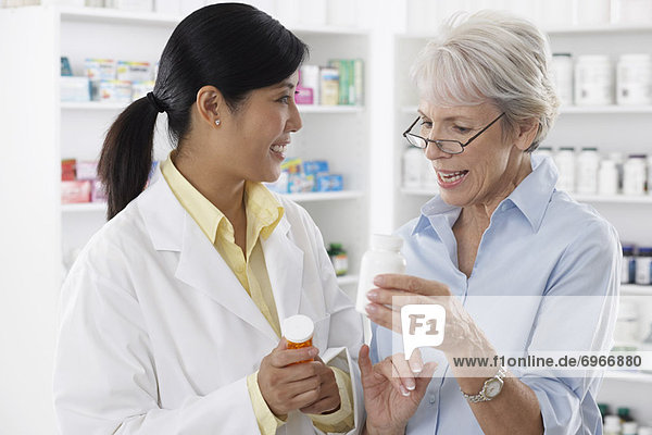 Pharmacist Talking to Client