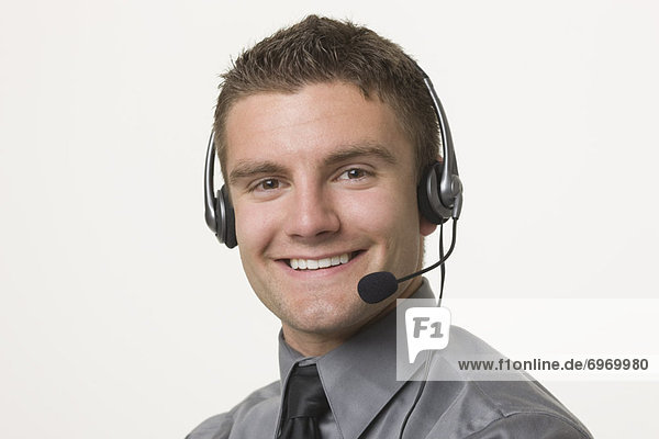 Portrait of Man wearing Headset