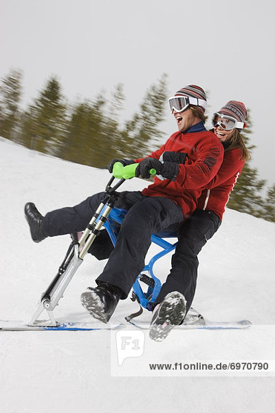 Couple Riding Skibikes  Near Frisco  Summit County  Colorado  USA