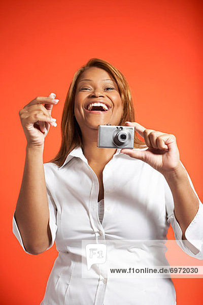 Portrait of Woman With Digital Camera