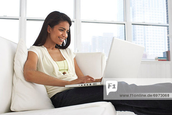 Woman Using Laptop Computer