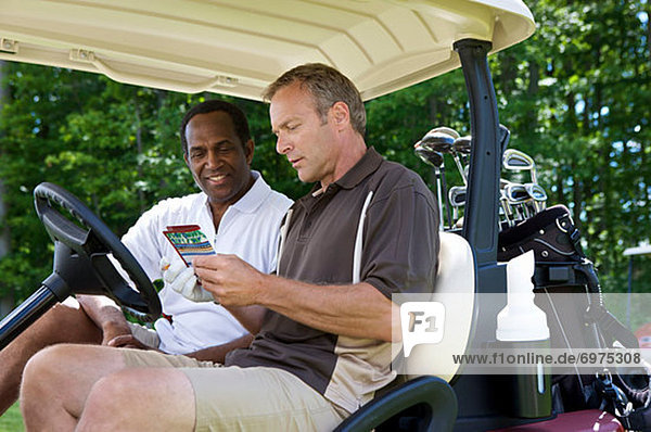 Golfers in Golf Cart with Scorecard  Burlington  Ontario  Canada