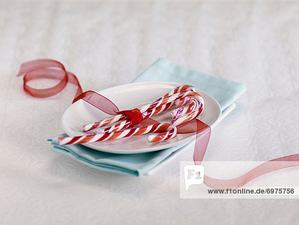 Spazierstock  Stock  Band  Bänder  Teller  rot  binden  Süßigkeit