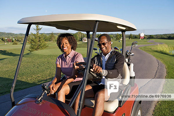 Couple in Golf Cart  Burlington  Ontario  Canada