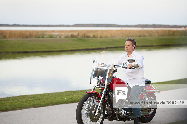 Man Riding Motorcycle