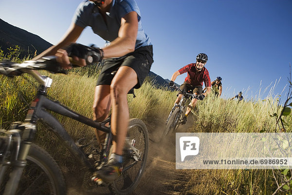 Group of Mountain Bikers on Dirt Trail  Near Steamboat Springs  Routt County  Colorado  USA