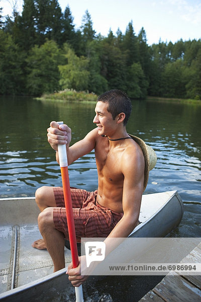 Teenage Boy Canoeing  Near Portland  Oregon  USA
