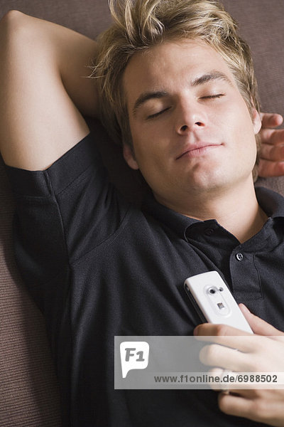 Man Napping with Cell Phone