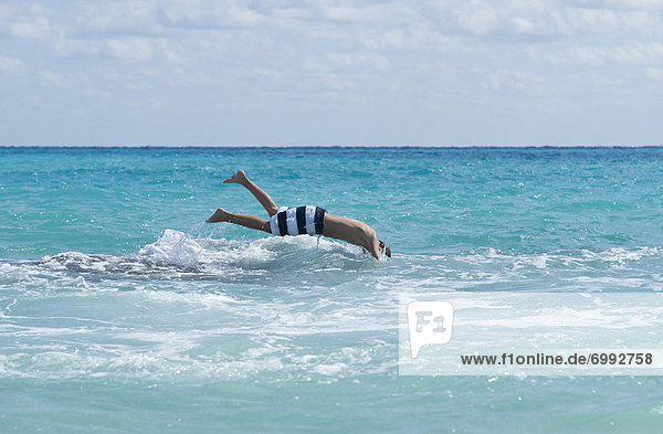 Boy Diving into Water  Playa del Carmen  Yucatan Peninsula  Mexico