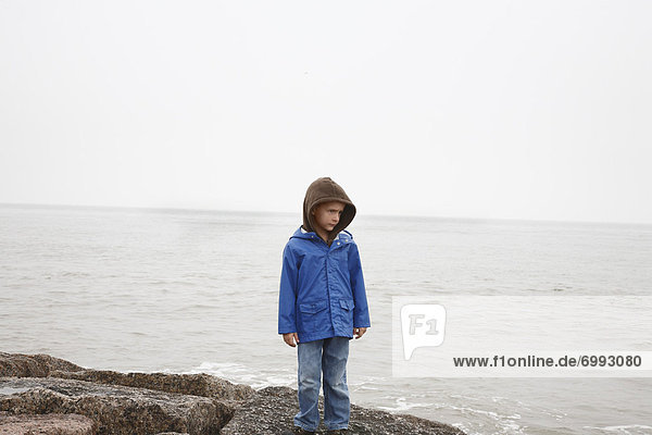 Portrait of Boy Standing on Beach  Seawall Beach  Galveston  Texas  USA