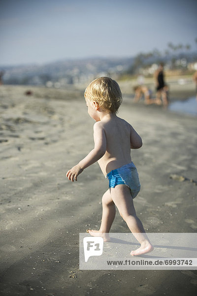Little Boy Running on the Beach  Mission Bay  San Diego  California  USA