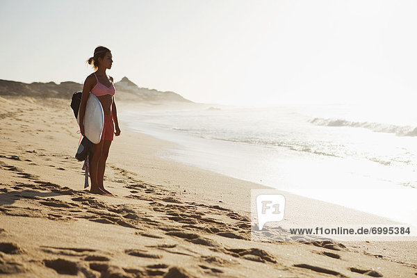 Woman Holding Surfboard  Baja California Sur  Mexico