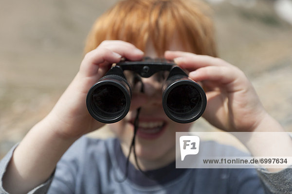 Boy with Binoculars  Jasper  Alberta  Canada