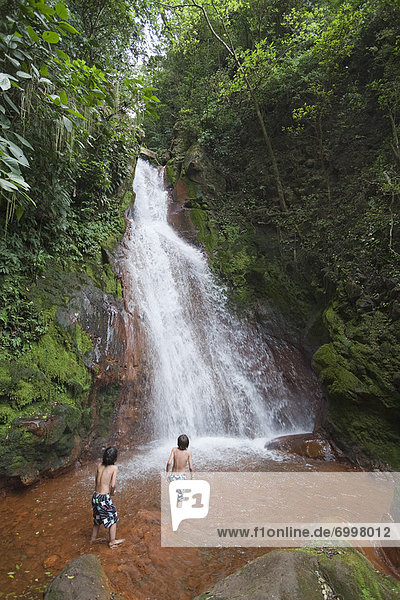Boys Playing in Waterfall  Miravalles  Cordillera de Guanacaste  Guanacaste  Costa Rica